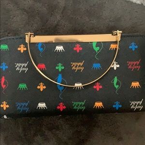 Baby phat clutch with gold crossbody chain